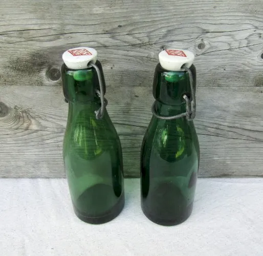 2 anciennes bouteilles BULACH Vintage lideal solidex