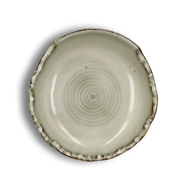 ASSIETTE COUPE NAKURU
22.5CM EN GRÈS GRIS ET
BEIGE