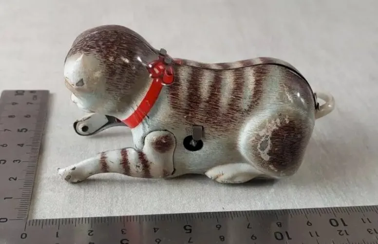 Ancien jouet en tôle, à clé, chat, Joustra