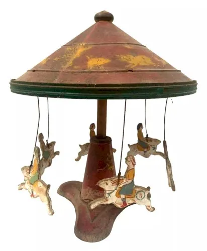 Jouet ancien en tôle peinte Le manège aux lapins XX siècle