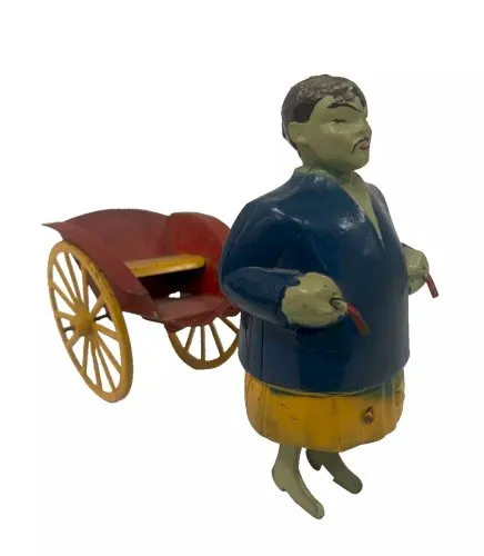 jouet ancien pousse pousse chinois en tôle peinte circa 1930 . XX siècle .