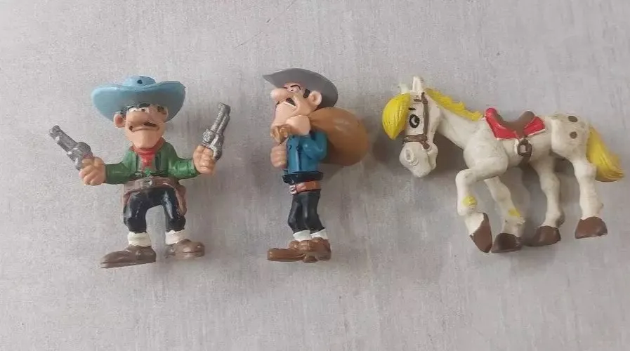 Lot d'anciennes figurines, Dalton + Jolly Jumper / Lucky Luke, Schleich Plastoy